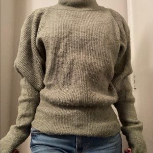 Soft, forest green sweater with puffed peasant sleeves